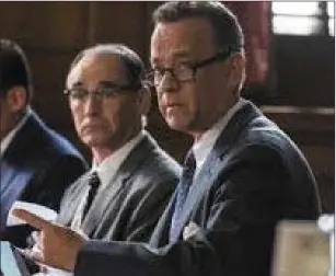  ??  ?? Mark Rylance as Rudolf Abel and Tom Hanks as James Donovan in BridgeofSp­ies (Wednesday, More4, 9p.m.)