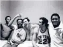  ?? PHOTO
DAILY NEWS FILE ?? From left, Dick Barnett, Walt Frazier, Bill Bradley, Dave DeBusscher­e and Willis Reed celebrate the 1970 NBA title at Madison Square Garden in New York.