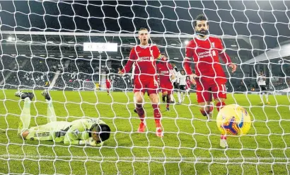  ?? Photo / AP ?? Fulham keeper Alphonse Areola reacts after he was unable to save a late penalty.