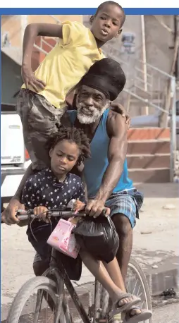  ?? JERMAINE BARNABY ?? This pedal cyclist was spotted in Naggo Head, Portmore, St Catherine, on Monday, December 26.