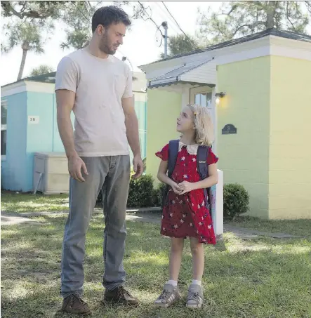  ?? WILSON WEBB/FOX SEARCHLIGH­T PICTURES ?? Chris Evans, left, and Mckenna Grace star in the new movie Gifted.