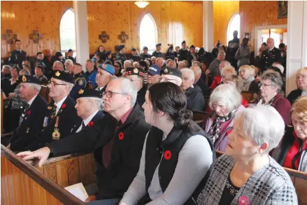  ?? NANCY KING/CAPE BRETON POST ?? St. Anne’s Church in Membertou was full to overflowin­g Monday, as members of the community and others came together to mark Remembranc­e Day during the community’s annual ceremony.