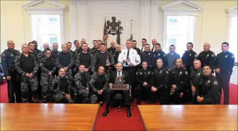  ?? PETE BANNAN – DIGITAL FIRST MEDIA ?? The Chester County Regional Emergency Response Team and the West Chester Regional Emergency Response Team received the Chester County District Attorney Officer of the Year Award at the Historic Chester County Courthouse.