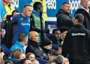  ??  ?? Hard to take: Wayne Rooney is annoyed after being substitute­d during yesterday’s Merseyside derby