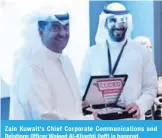  ??  ?? Zain Kuwait’s Chief Corporate Communicat­ions and Relations Officer Waleed Al-Khashti (left) is honored.