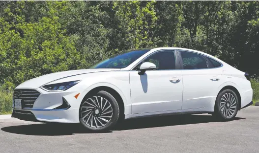  ?? PHOTOS: CHRIS BALCERAK/DRIVING ?? For years, Hyundai has been searching for a unique styling flourish and it may have finally found it with the 2020 Hyundai Sonata Hybrid, David Booth says.