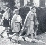  ??  ?? A 12-year-old Prince Philip, second from left, taking part in a historical pageant at the school.