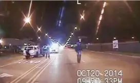  ?? Chicago Police Department via Associated Press ?? Laquan McDonald, 17, right, walks down the street moments before being fatally shot 16 times by Chicago police officer Jason Van Dyke.