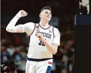  ?? Christian Petersen/Getty Images ?? UConn’s Donovan Clingan is now focused on getting ready for the NBA Draft with national titles on his resume.