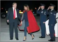  ?? THE ASSOCIATED PRESS ?? President Donald Trump and first lady Melania Trump arrive on Air Force One at Palm Beach Internatio­nal Airport, in West Palm Beach, Fla., Friday.