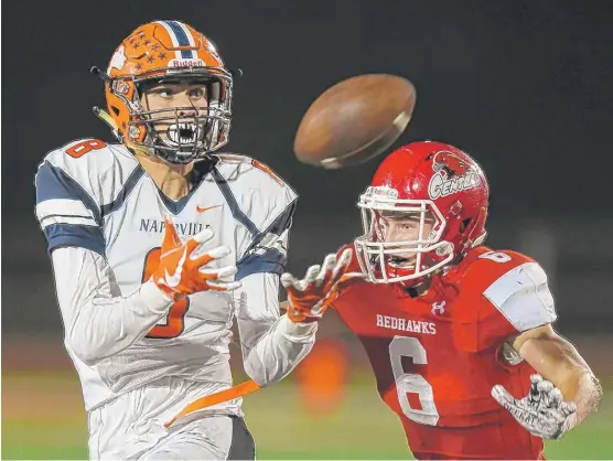  ?? | JOE LEWNARD/ DAILY HERALD ?? Naperville North wide receiver Nick Calcagno ( left), who has a scholarshi­p offer fromNorthe­rn Illinois, likely won’t pick a school until the end of the month.