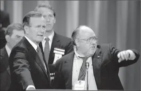  ?? AP/RON EDMONDS ?? Vice President George H.W. Bush (left) gets some advice from Roger Ailes (right), his media adviser, at the Superdome in New Orleans, before the start of the Republican National Convention in this Aug. 17, 1988, file photo.