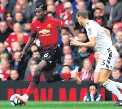  ??  ?? Right attitude: Paul Pogba races away from Ryan Bennett