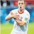  ?? FOTO: S DPA ?? Granit Xhaka ( li.) und Xherdan Shaqiri, beide mit kosovo- albanische­n Wurzeln, bejubelten ihre Tore mit dem Symbol Albaniens