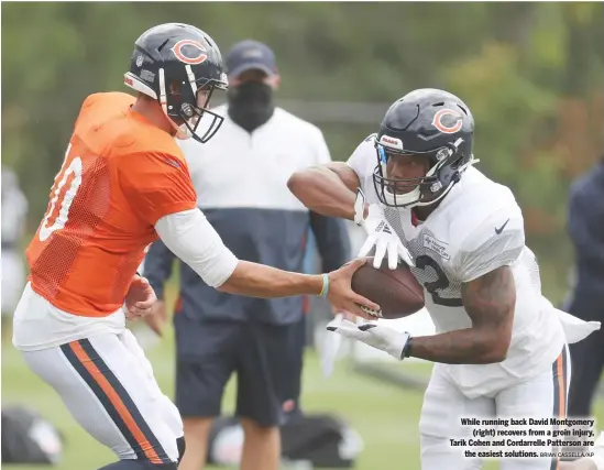  ?? BRIAN CASSELLA/AP ?? While running back David Montgomery (right) recovers from a groin injury, Tarik Cohen and Cordarrell­e Patterson are the easiest solutions.