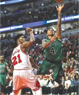  ??  ?? Bulls defensive stalwart Jimmy Butler probably will be guarding Celtics star Isaiah Thomas at key points during their first- round series.
| JONATHAN DANIEL/ GETTY IMAGES