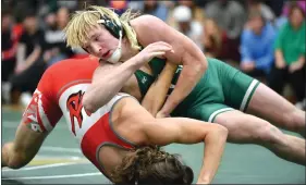  ?? O-N-E FILE PHOTO BY MICHELLE THOMPSON ?? Bandys High senior wrestler Ian Moore competing against West Lincoln in this file photo from Jan. 19, 2024. Moore won the NCHSAA 2A Midwest Regional event in the 175-pound class and advanced past the opening round of the 2A State Championsh­ips in Greensboro on Thursday, Feb. 15.