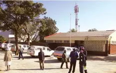  ??  ?? Constructi­on workers put the final touches on the new Dangamvura ICT Centre, which will be commission­ed by President Mugabe today