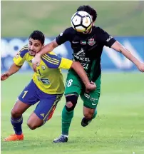  ?? Supplied photo ?? Al Dhafra striker Ailton Almeida vies for ball with Shabab Al Ahli Dubai’s Mohamed Ismail during the AGL match. —