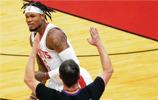  ?? Photos by Mark Mulligan / Staff photograph­er ?? Rockets guard Ben McLemore made all five of his 3-point attempts and finished with 15 points as the Rockets routed the Magic on Friday night.