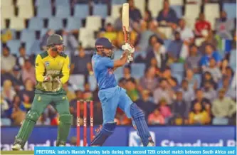  ??  ?? PRETORIA: India’s Manish Pandey bats during the second T20I cricket match between South Africa and India at Super Sport Park Stadium in Pretoria yesterday. — AFP