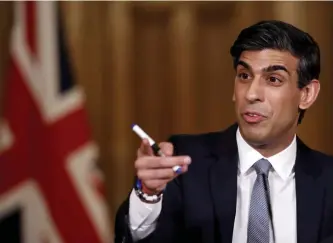  ?? AP FILE ?? CASHED OUT: British authoritie­s are exploring the possibilit­y of creating a new digital currency that Treasury chief Rishi Sunak touted as ‘Britcoin.’