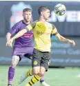  ?? AFP ?? Dortmund’s Christian Pulisic, right, in action against Liverpool.