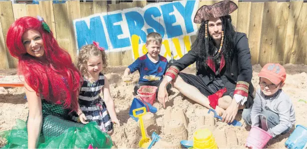  ?? Carl Sukonik The Vain Photograph­y ?? ●●Youngsters Eloise Blackmore, Oliver White and Wyatt Ryder enjoy the pirate and mermaid-themed beach at Merseyway