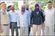  ?? HT PHOTO ?? The accused in police custody in Hoshiarpur on Monday.