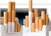  ?? AFP ?? REPUBLIC ACT 7171, directs the DBM to allot 15% of the taxes collected on locally manufactur­ed Virginia-type cigarettes to the tobacco-producing local government units.