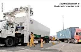  ??  ?? A SCANNER at the Port of Manila checks a container truck.