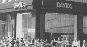  ?? PETER J. THOMPSON / NATIONAL POST ?? Davids Footwear on Toronto’s Bloor Street. Most shoes are hit with an 18 per cent tariff, but “clerical or ecclesiast­ical” shoes only pay 7.5 per cent.