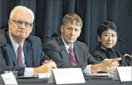  ?? PHOTOS BY BRENNAN LINSLEY / AP ?? Consumer Financial Protection Bureau Director Richard Cordray (center) and his CFPB colleagues David Silberman (left) and To-Quyen Truong attend a hearing Wednesday where the agency’s proposal on arbitratio­n was discussed.