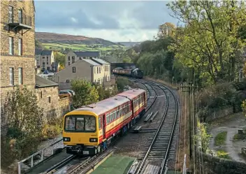  ?? MARTYN TATTAM ?? KWVR ‘Pacer’ No. 144011 is seen in its reinstated Metro Trains livery during a short test run from Haworth
Yard to the top of Haworth Loop on the afternoon of October 30.