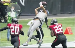  ?? BRYNN ANDERSON — THE ASSOCIATED PRESS ?? Detroit Lions wide receiver Kenny Golladay (19) makes the catch against Atlanta Falcons strong safety Keanu Neal (22) during the second half of Sunday’s game in Atlanta.