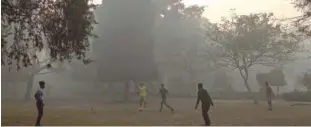  ?? Agence France-presse ?? Youth play football amid air pollution smog at Lodhi Gardens in New Delhi on Saturday.