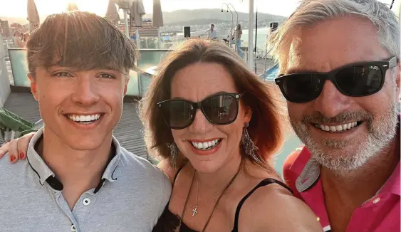  ?? ?? Devoted: Barney with parents Emma and David enjoying a holiday in Mallorca