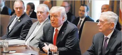  ?? Evan Vucci ?? The Associated Press President Donald Trump speaks during a Cabinet meeting Wednesday at the White House. From left are Secretary of Interior Ryan Zinke, Secretary of State Rex Tillerson, Trump, and Secretary of Defense Jim Mattis.