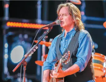  ?? AP FILE PHOTO ?? Jeff Hanna of the Nitty Gritty Dirt Band performs at the CMA Music Festival in Nashville, Tenn., in June 2016. Hanna and his bandmates will be on stage tonight at CN Centre.