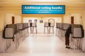  ?? Santiago Mejia / The Chronicle ?? Diem Vo casts a ballot in San Francisco City Hall on Feb. 15 in a special city election. Low voter turnout usually benefits a motivated minority.