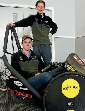  ?? TAMARA THORN/STUFF ?? Matthew Dean [18] and Jack Pol [18] with their EVolovity bike which was raced last weekend.