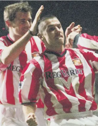  ??  ?? Kevin Phillips celebrates in Sunderland’s win at Newcastle in 2000.