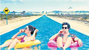  ?? Palm Springs ?? Escapism: Cristin Milioti and Andy Samberg in