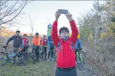  ?? -"83&/$& 108&-- ?? Jeff Redden, who owns the Home Hardware in Windsor, takes a selfie with the group of bikers who rode the Harvest Moon Trailway from Annapolis Royal to Grand Pré Nov.1. “This trail is giving back to the Valley what the 101 took away,” Redden said Nov. 2...