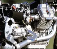  ??  ?? Four-valve heads, 999cc, 11.5:1 and bigger carbs meant 115bhp
