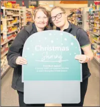  ??  ?? ■ Central England Co-operative colleagues are celebratin­g after more than 40,000 items were donated as part of the Christmas Food Bank Appeal.