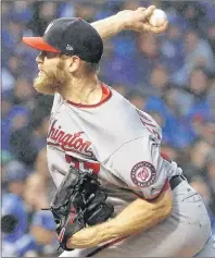  ?? AP PHOTO ?? Washington Nationals starting pitcher Stephen Strasburg throws during the seventh inning of Game 4 of baseball’s National League Division Series against the Chicago Cubs on Oct. 11 in Chicago.