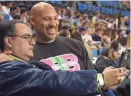  ?? RICHARD MACKSON/USA TODAY SPORTS ?? LaVar Ball, right, has not shied away from the spotlight, making the rounds on TV shows and posing for selfies, including with Robert Pacheco, left.