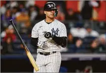  ?? John Minchillo / Associated Press ?? New York Yankees Gleyber Torres tosses his bat after striking out against the Houston Astros to end the seventh inning of Game 4 of the American League Championsh­ip series on Oct. 23 in New York.