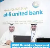  ??  ?? KUWAIT: The ministry of Commerce and Industry’s representa­tive attends the draw at Ahli United Bank headoffice.